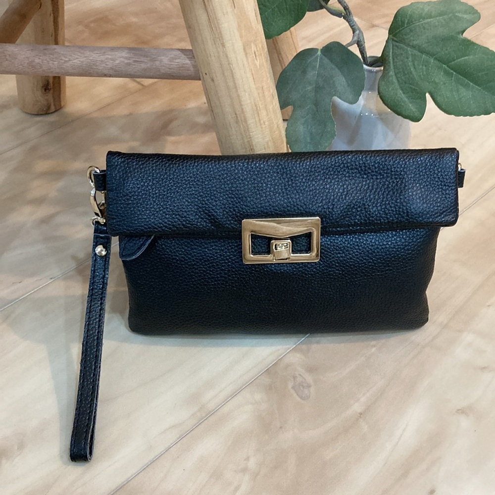 Sondra Robert’s black genuine leather clutch